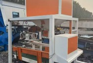出售二手双计量料斗+牵引输送+缝包一体化定量装袋机