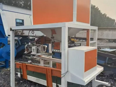 出售二手双计量料斗+牵引输送+缝包一体化定量装袋机